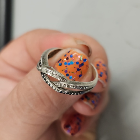 Both diamond rings. 10k full sylver and white and teal.sylver... Size 6-7